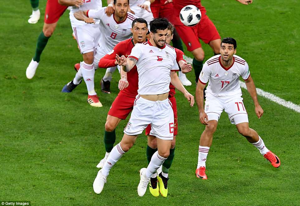 4DA08B1600000578-5884095-Ezatolahi_came_closest_to_scoring_in_the_first_half_for_Iran_but-a-6_1529953180732